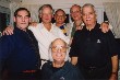 Alistair McIntosh, Colin McCartney, Jock McCartney, Stafford McCartney and Jerome Mendes, (front) Kingsley McCartney.  Middleton on Sea, Sussex, England. 2003